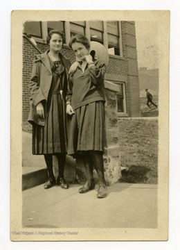 Back of photo reads: "Lorena Spencer and Mary Rinehart up at school. May 1923."