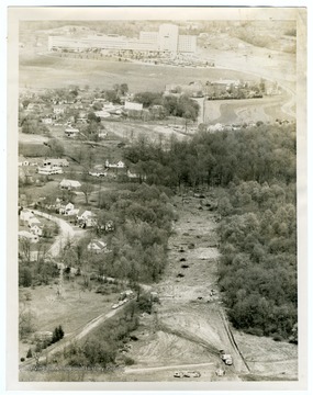 Patteson Drive in the early stages of construction. The newly completed University Hospital and Medical Center can be seen at the top of the picture. 