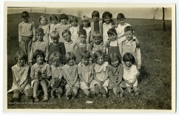 Students at the Rosedale School pose for a group photo. Pictured are Joe Hawes, Delvis Reese, Garnet Richards, Margaret Humphreys, May Savage, Sophie Bartylla, Dorothy Savage, Julia Fraze, Ralph Mayles, William Richards, Herschel Champ, Clyde Edgell, Carlos Humphrey, Bruce Savage, Billie Fraze, Henry Hawes, Lucille Lambert, Rosa Fraze, Margaret Lambert, Beatrice Allhiser, Waunita Hawes, Pauline Reese, Charlotte Cathell, and Isabelle Fraze.