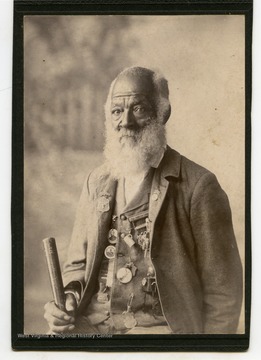 Shields was the body servant of Colonel James Kerr Edmondson, Company H, 27th Virginia Infantry, "Stonewall Brigade" during the Civil War. Shields, shown here wearing several medals awarded to him by Confederate Veterans Groups, claimed to have also cooked for General Thomas "Stonewall " Jackson.