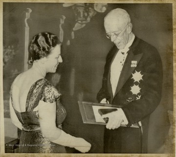 Pearl Buck becomes the first American woman to win Nobel Prize for literature as she receives award from King Gustav of Sweden during ceremonies at Stockholm. She also won the Pulitzer Prize in 1932.
