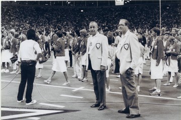 Don Smith (L) and Rene Henry (R) at halftime during the Dallas Cowboys-Pittsburgh Steelers game while on on week long tour of US Olympic Medal winners.
