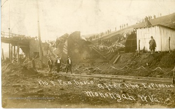 Fan house at Monongah Mine No.8 after the explosion. Back: "This is the most terrible explosion of its kind that ever happened in the U.S. We were up yesterday. Will write in a few days. It shook here considerably. [illegible]" To Mr. Okey May in Terra Haute, Indiana.