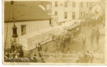 Hearses taking caskets from the streets of Monongah to Monongah Mine No.6.