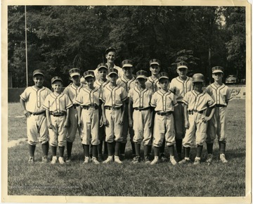 A photo of the "SF" Little League baseball team.