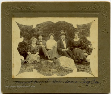 A picture of Willis, Cora, and Lakie Hatfield with Margaret Bunford and an unidentified person.