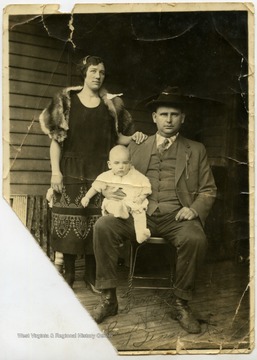 A picture of Tennis Hatfield with his wife, Sadie Hatfield, and his son, Tennis Jr.
